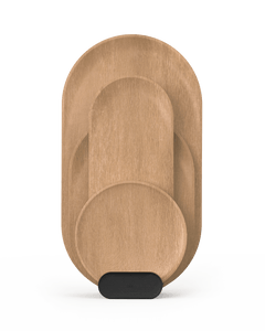 A set of wooden cutting boards of different sizes placed in a black holder