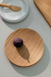 Fig placed on a round cutting board
