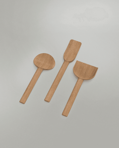 Wooden spatula trio containing shovel-like spatula, standard spatula and a round spatula